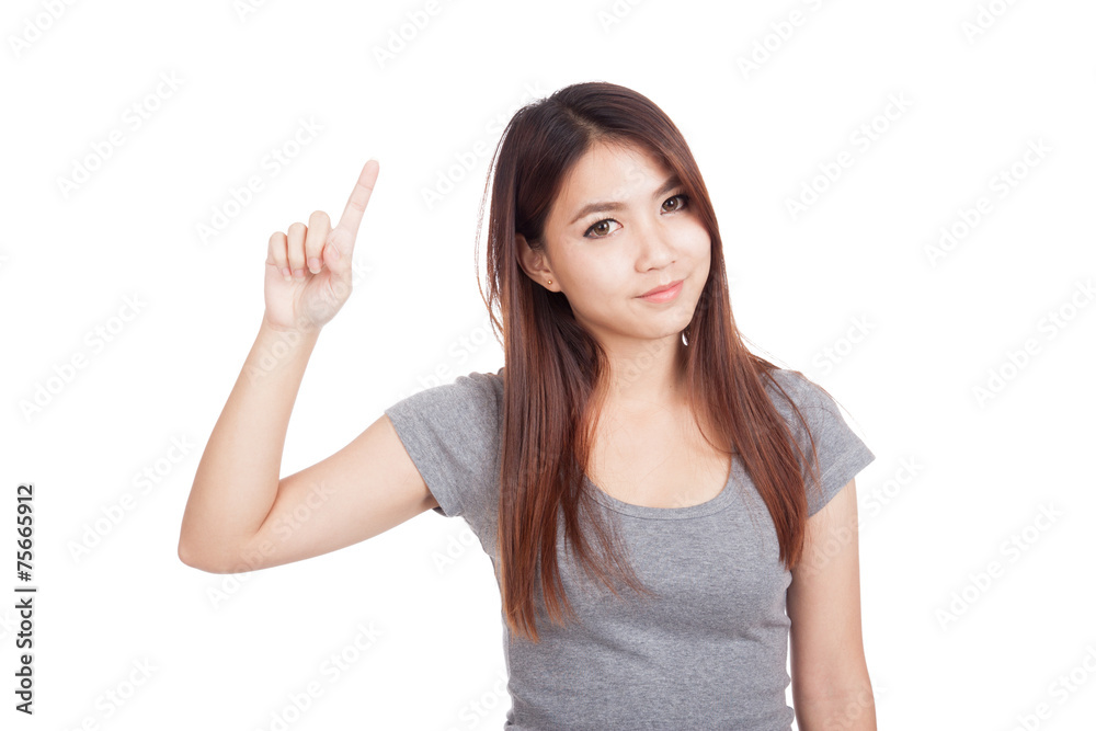 Young Asian woman smile and point up Young Asian woman smile and point up
