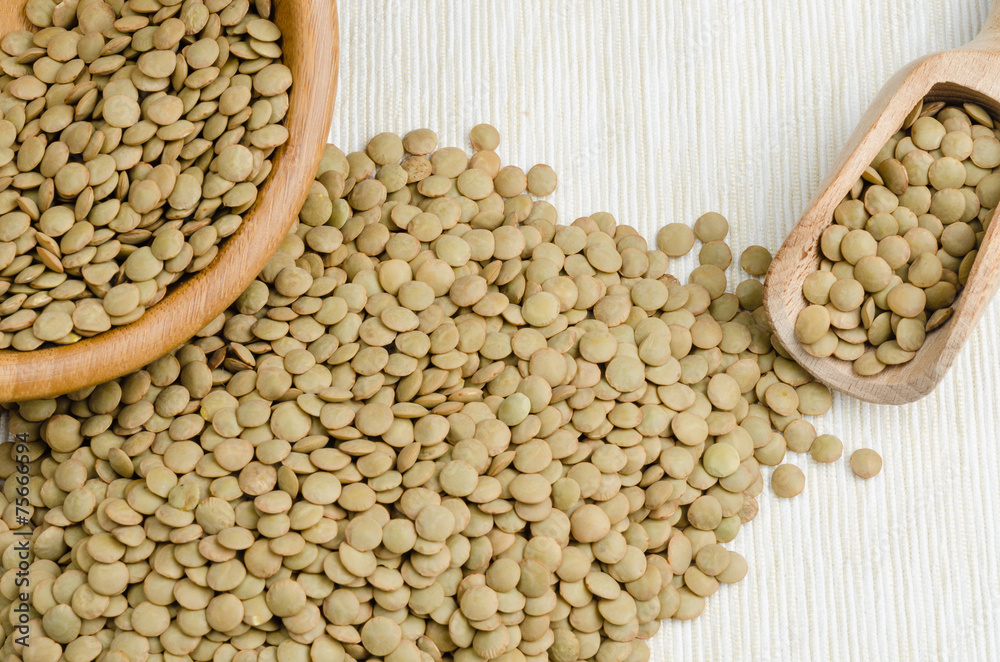 Fototapeta premium lentils, on table cloth, background, close up