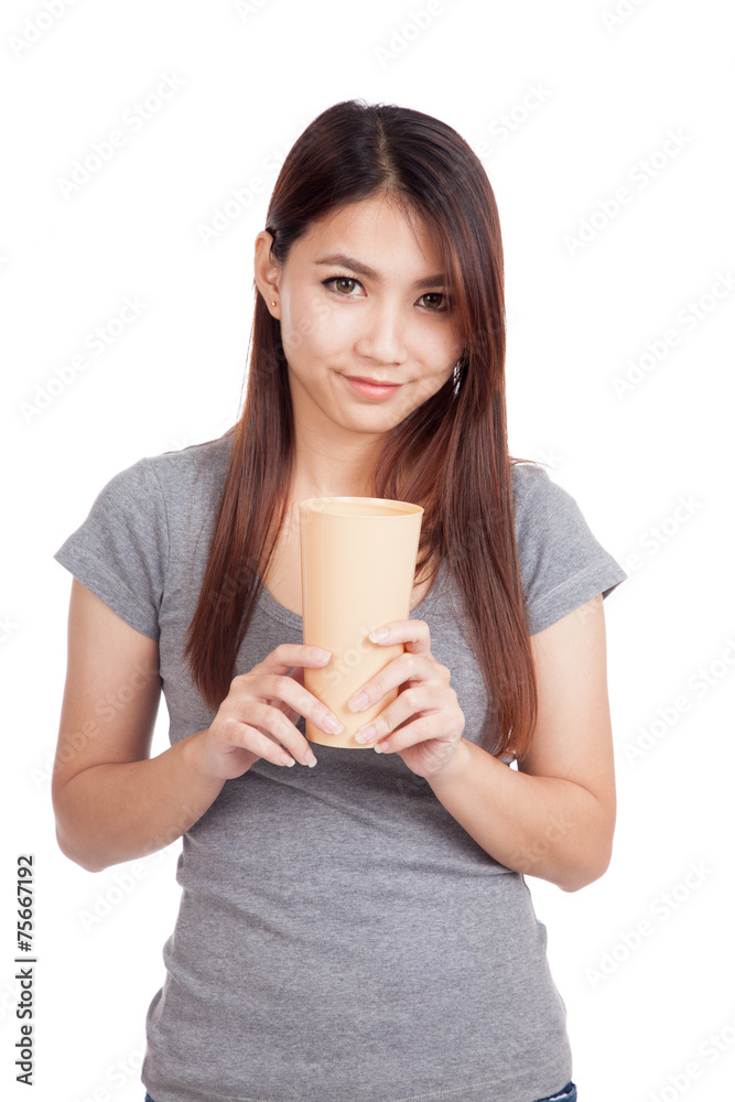 Young Asian woman with tall plastic glass Young Asian woman with tall plastic glass