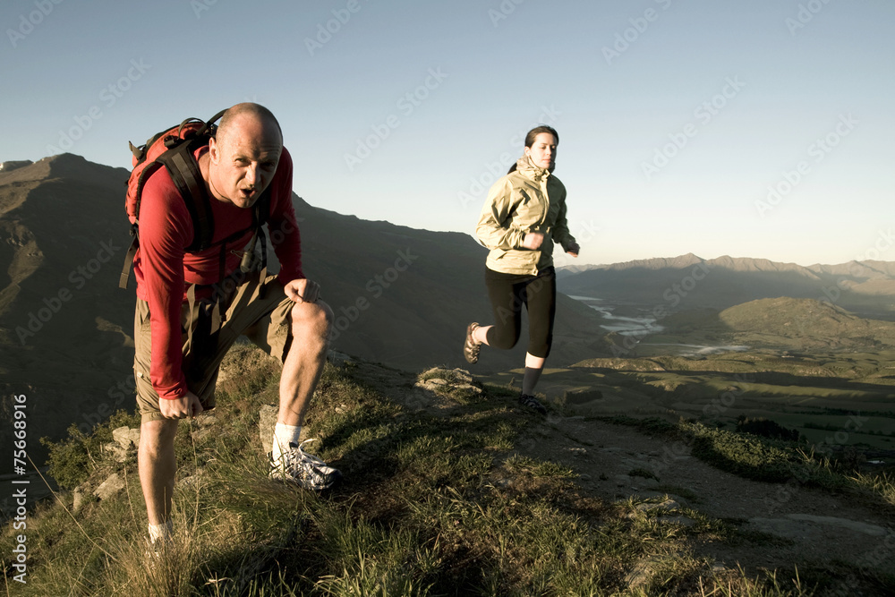 Extreme Athletes Exercising in the Mountains