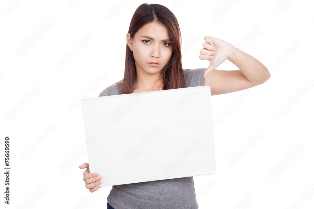 Young Asian woman thumbs down with blank sign Young Asian woman thumbs down with blank sign