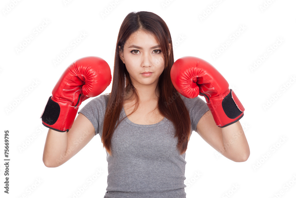 Young Asian woman with red boxing glove Young Asian woman with red boxing glove