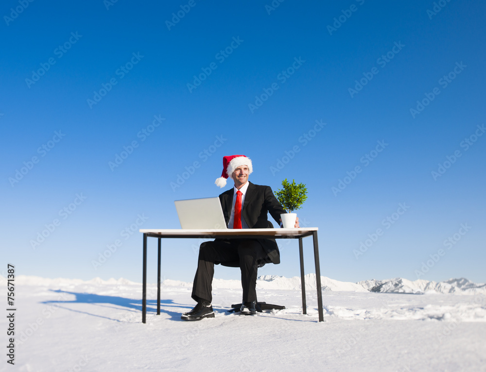 Businessman working Wintertime Holiday Vacation Concept Businessman working Wintertime Holiday Vacation Concept