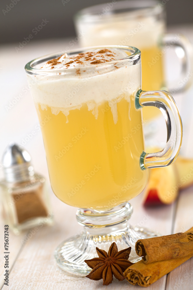 Hot apple punch made of apple juice, ginger, anise, cinnamon Hot apple punch made of apple juice, ginger, anise, cinnamon