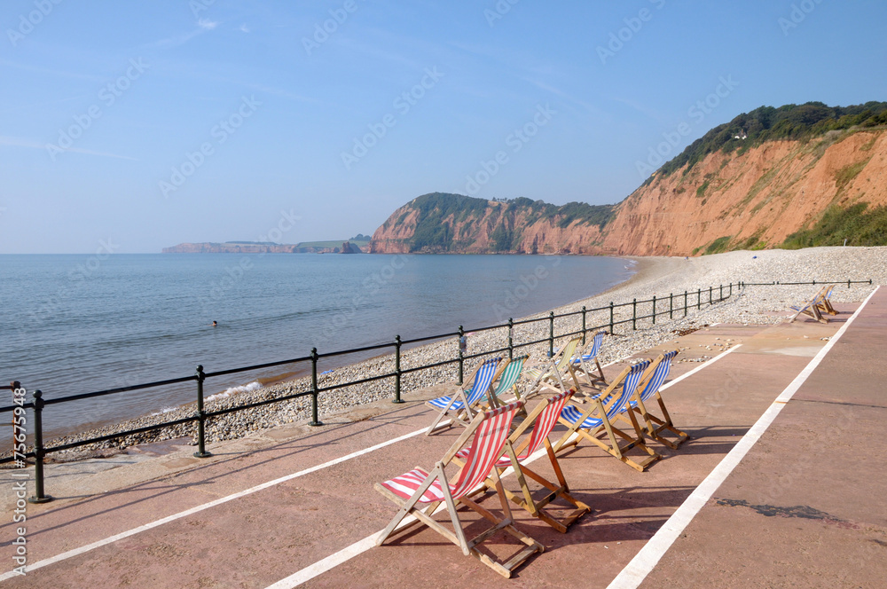 Deckchairs on seafront at Sidmouth in Devon