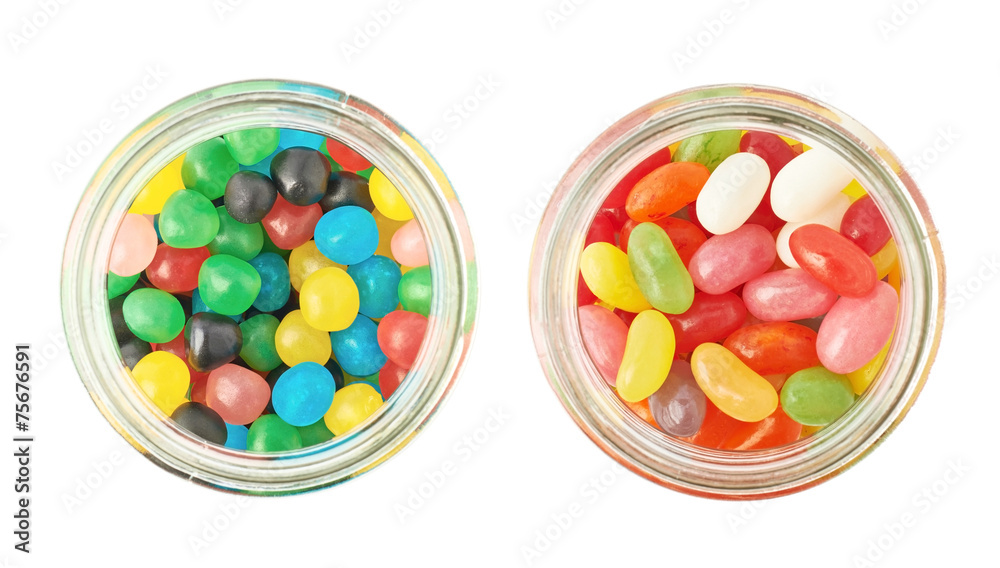Two jars full of different kinds of candies Two jars full of different kinds of candies