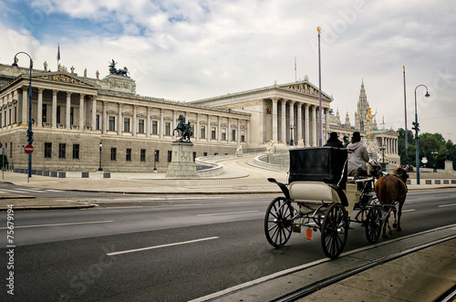 Carriage with horses in front of the Austrian Parliament