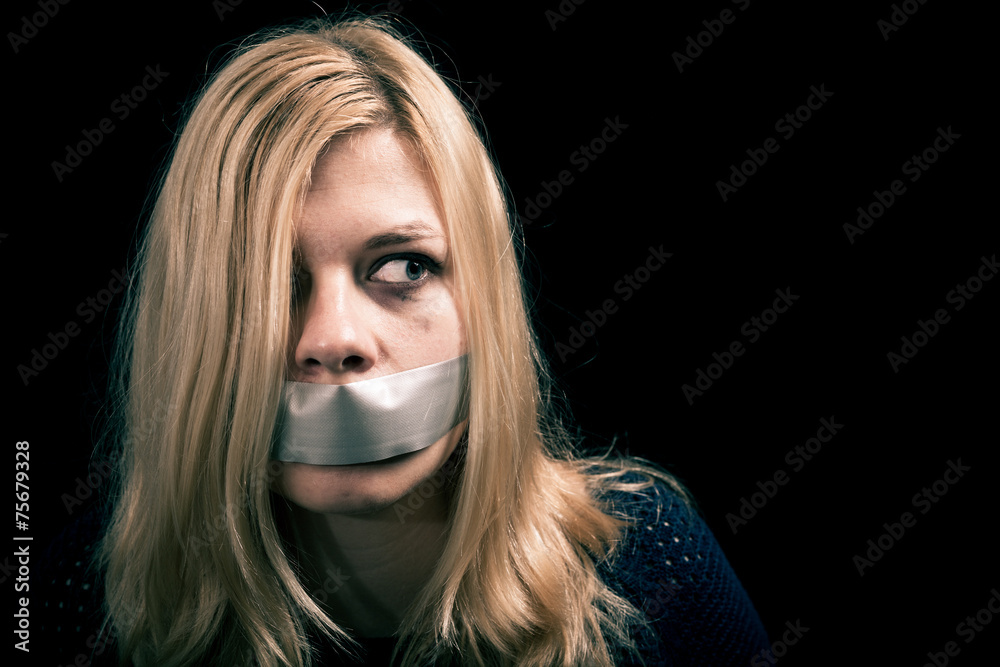Kidnapped woman hostage with tape over her mouth Stock Photo Adobe Stock