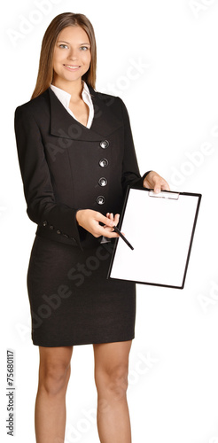 Business woman holding a pen and clipboard.