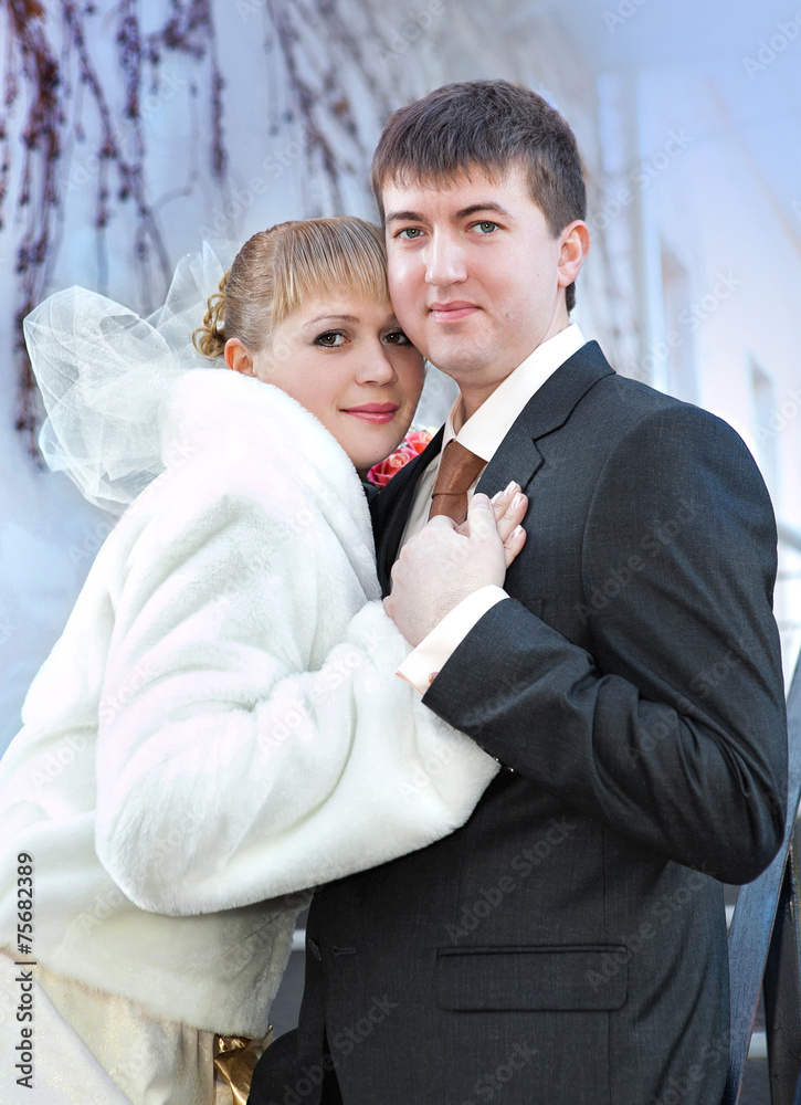 Happy bride and groom on wedding day sky background Happy bride and groom on wedding day sky background