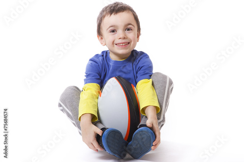 child with rugby ball