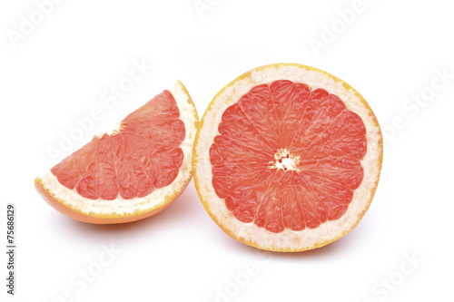 Grapefruit slices on white background