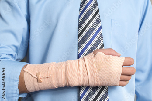 Hand injured businessman , insurance concept