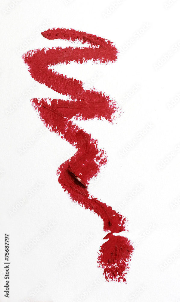Red color lipstick stroke on white paper Red color lipstick stroke on white paper