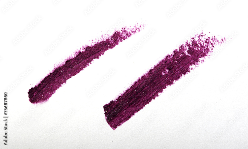 Purple color lipstick stroke on white paper Purple color lipstick stroke on white paper