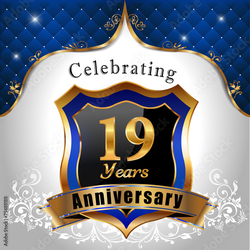 celebrating 19 years anniversary, sheild with royal emblem