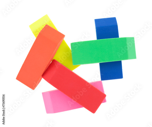 Several erasers on a white background.