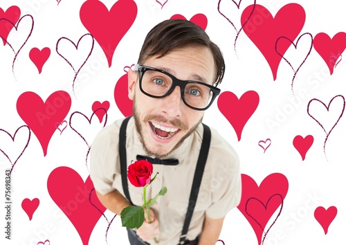 Фотография Composite image of geeky lovesick hipster holding rose