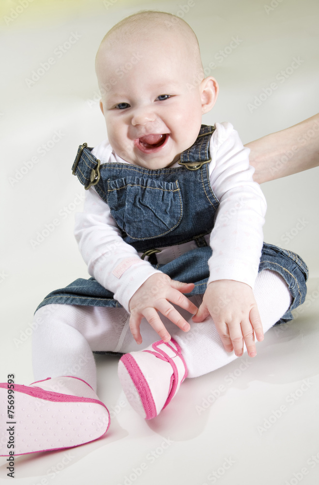 Fototapeta premium sitting baby girl