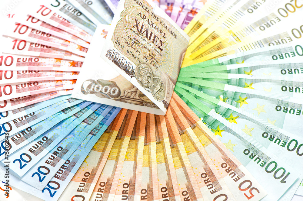 old greek drachma and euro cash notes. euro financial crisis old greek drachma and euro cash notes. euro financial crisis