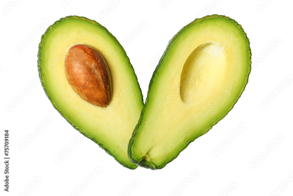 Fresh avocado in the shape of a heart isolated on white