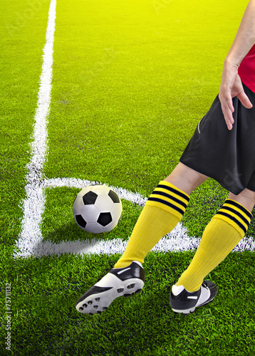 Soccer player in a corner kick