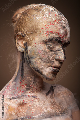 close up portrait of sad woman with face art. Scarry portrait