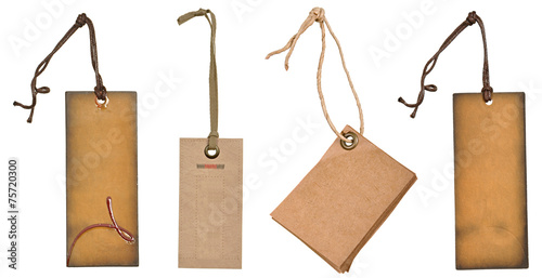 grungy aged paper tags with metal rivets and simple traditional