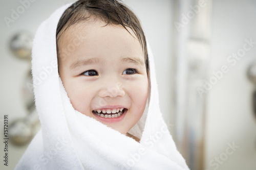 Mixed Race Boy Having Fun a...