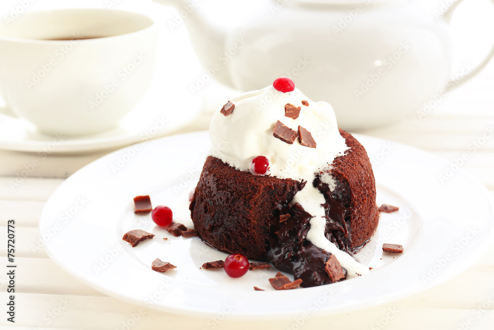 Hot chocolate pudding with fondant centre with ice-cream, Hot chocolate pudding with fondant centre with ice-cream,