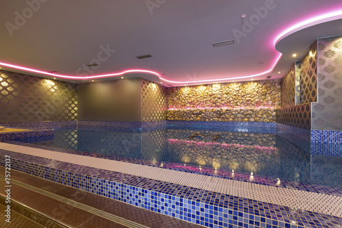 Swimming pool in luxury hotel spa center 