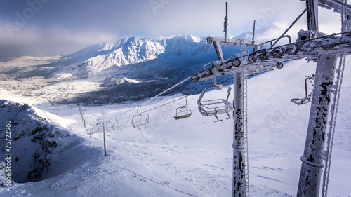 Aerial lifts frozen in the mountains in winter