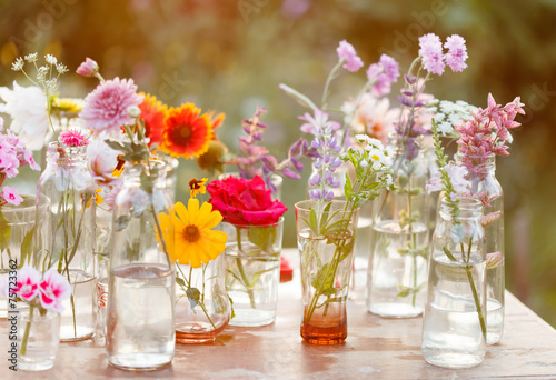 Fototapeta Naklejka Na Ścianę i Meble -  nice flowers in the bottles