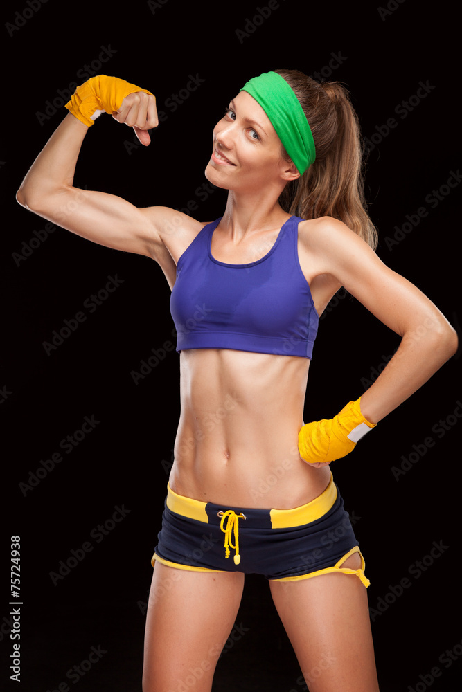 Portrait of young beautiful fitness woman. Fighter girl Portrait of young beautiful fitness woman. Fighter girl