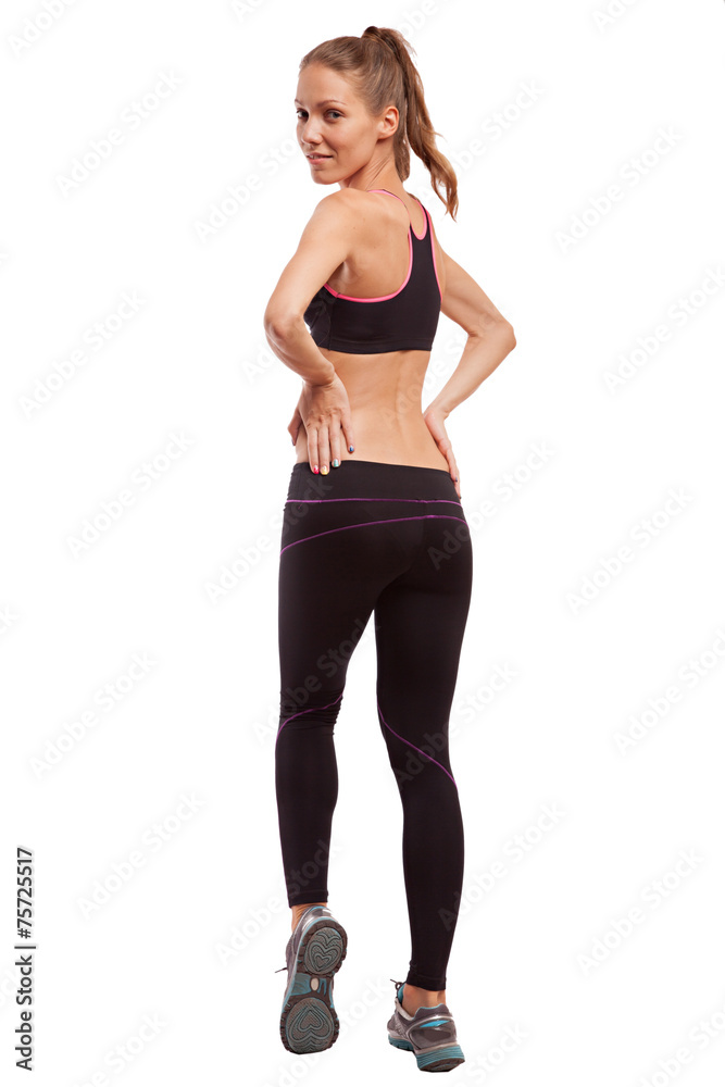 Young beautiful fitness girl doing streching exercise. isolated Young beautiful fitness girl doing streching exercise. isolated