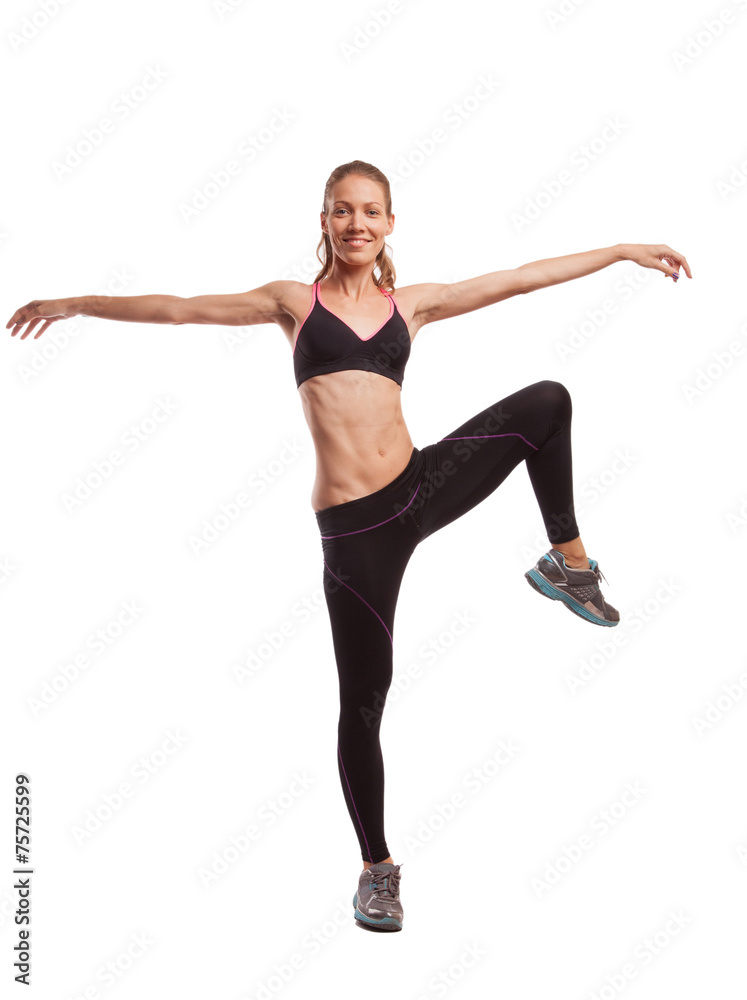 Young beautiful fitness girl doing streching exercise. isolated 