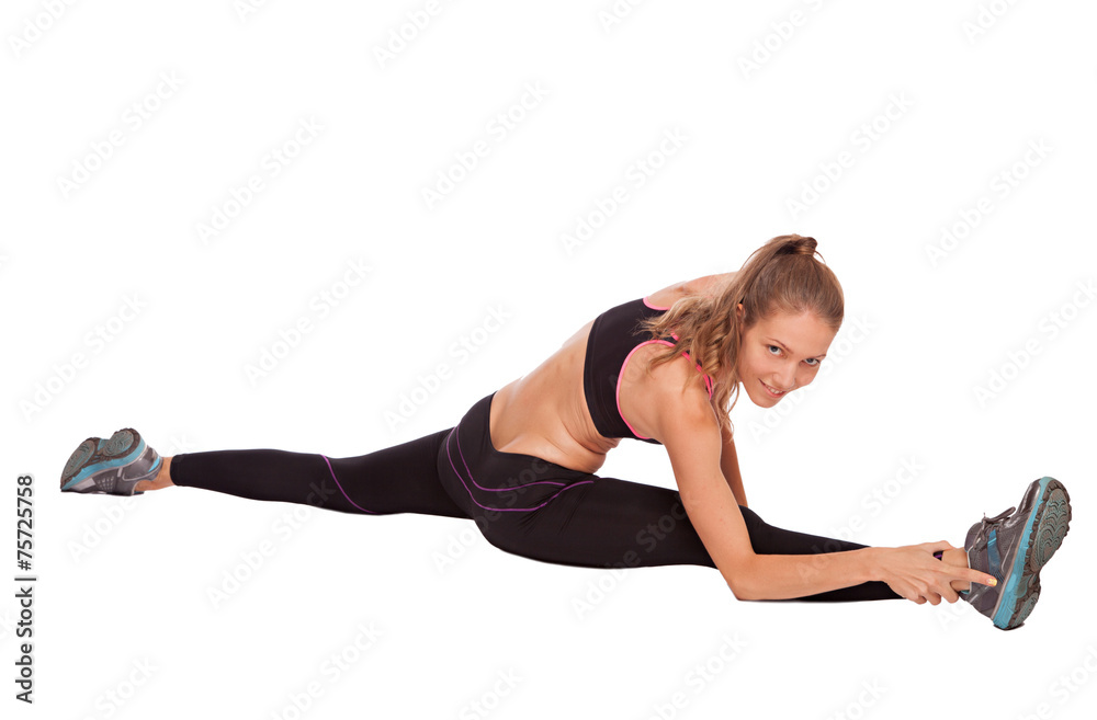 Young beautiful fitness girl doing streching exercise. isolated Young beautiful fitness girl doing streching exercise. isolated