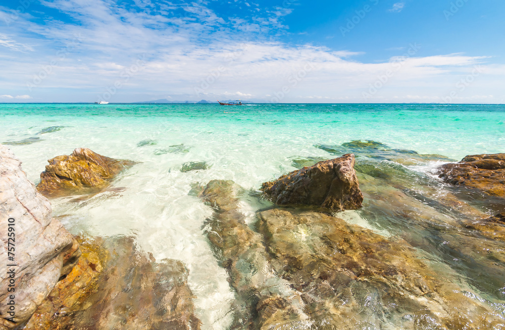 Rocks in beautiful turquoise crystal clear sea water