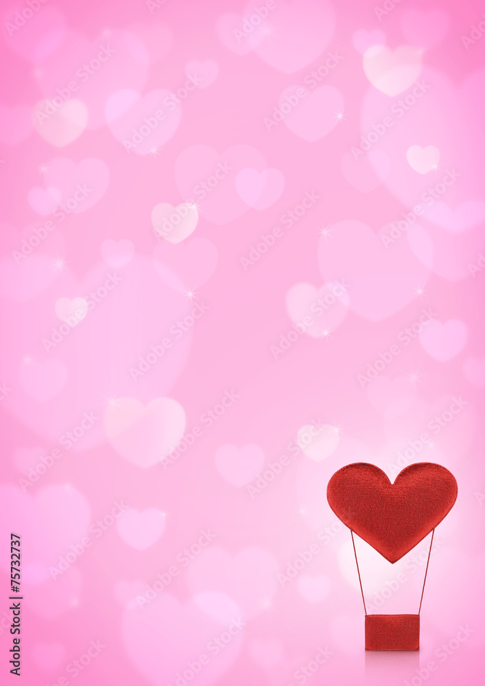Red heart air balloon on pink heart bokeh background