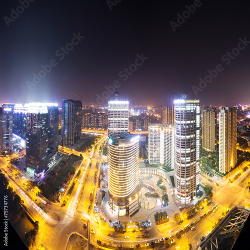 traffic trails and cityscape,buildings at night