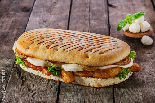 grilled sandwich with chicken and mozzarella cheese photo