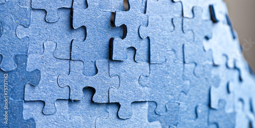 Backside of blue puzzle jigsaw