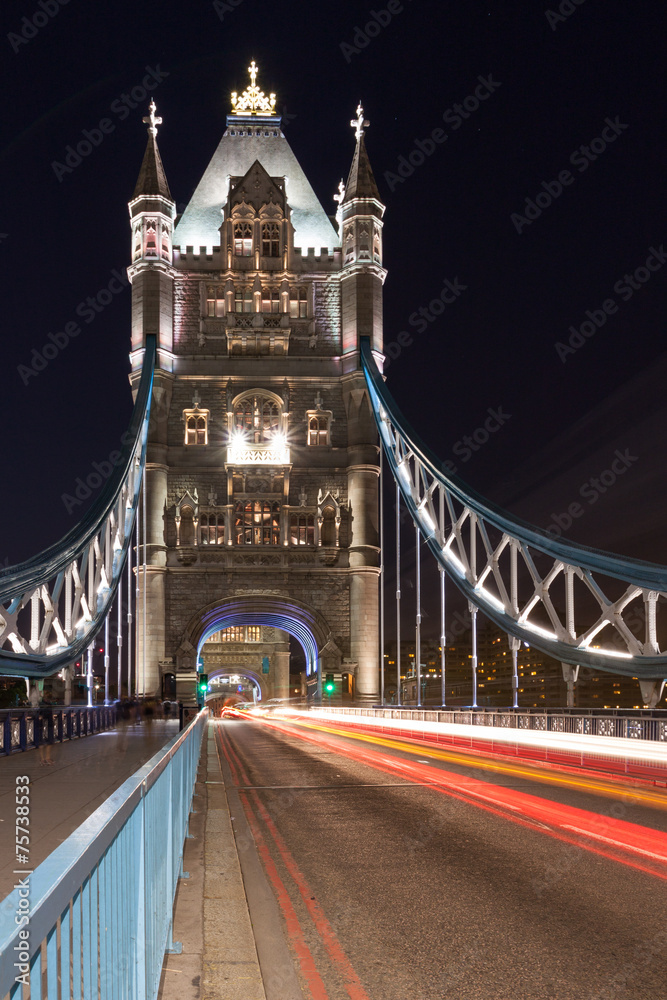 Obraz premium Tower Bridge and car lights trail in London, UK