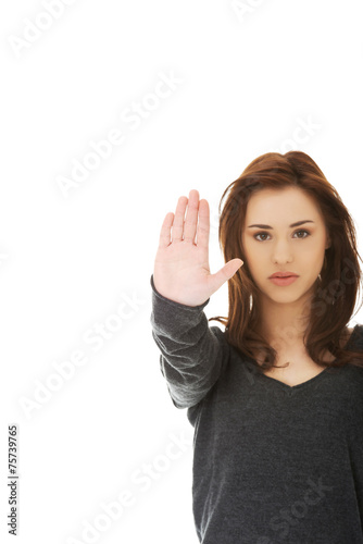 Woman pointing stop by hand