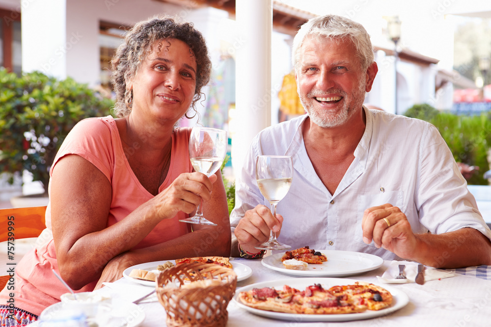 Mature Couple Eating Meal Outdoors Together Mature Couple Eating Meal Outdoors Together
