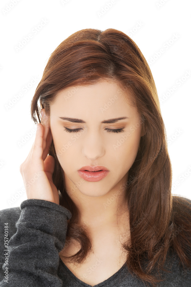 Fototapeta premium Young woman with a headache