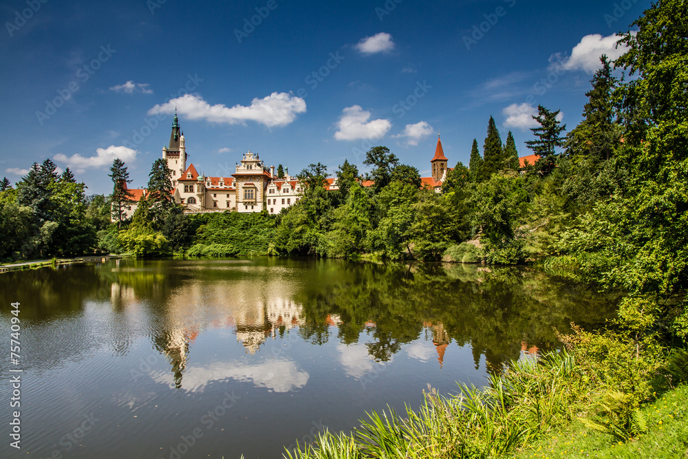 Castle with reflection in pond and blue sky - Pruhonice, Prague
