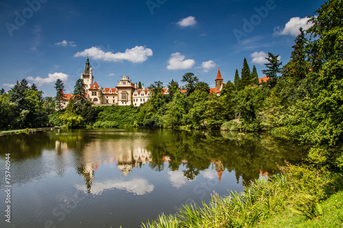Castle with reflection in pond and blue sky - Pruhonice, Prague