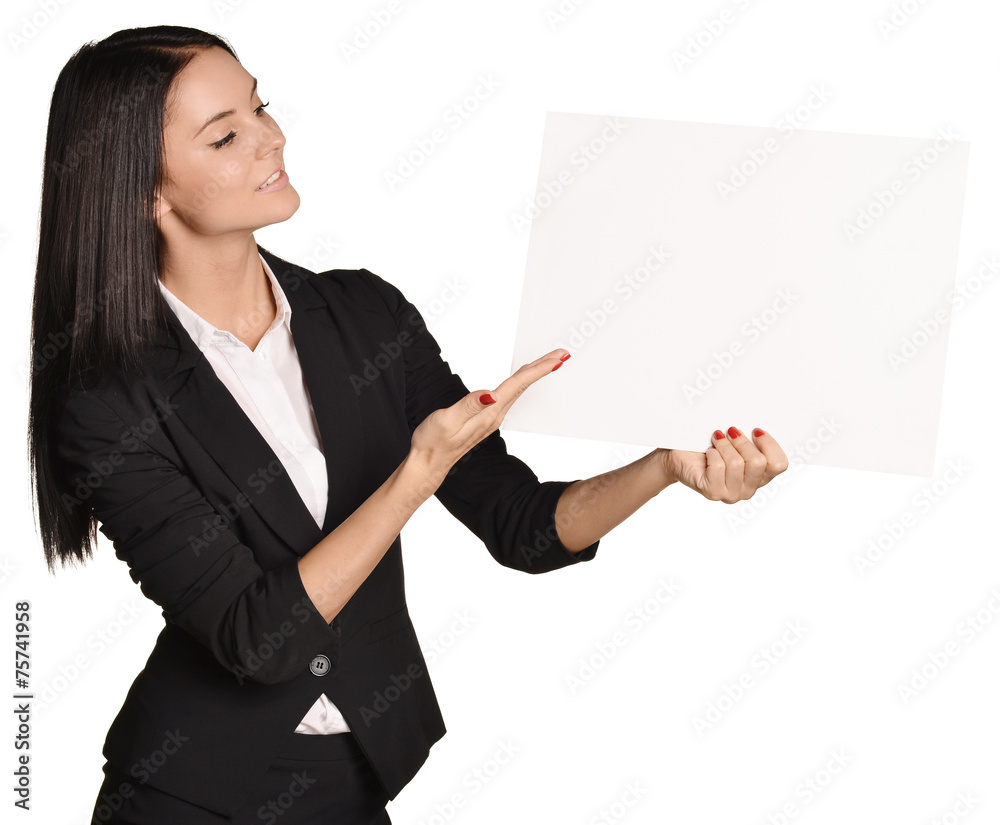Business woman holding in hand a blank sheet of white cardboard Business woman holding in hand a blank sheet of white cardboard