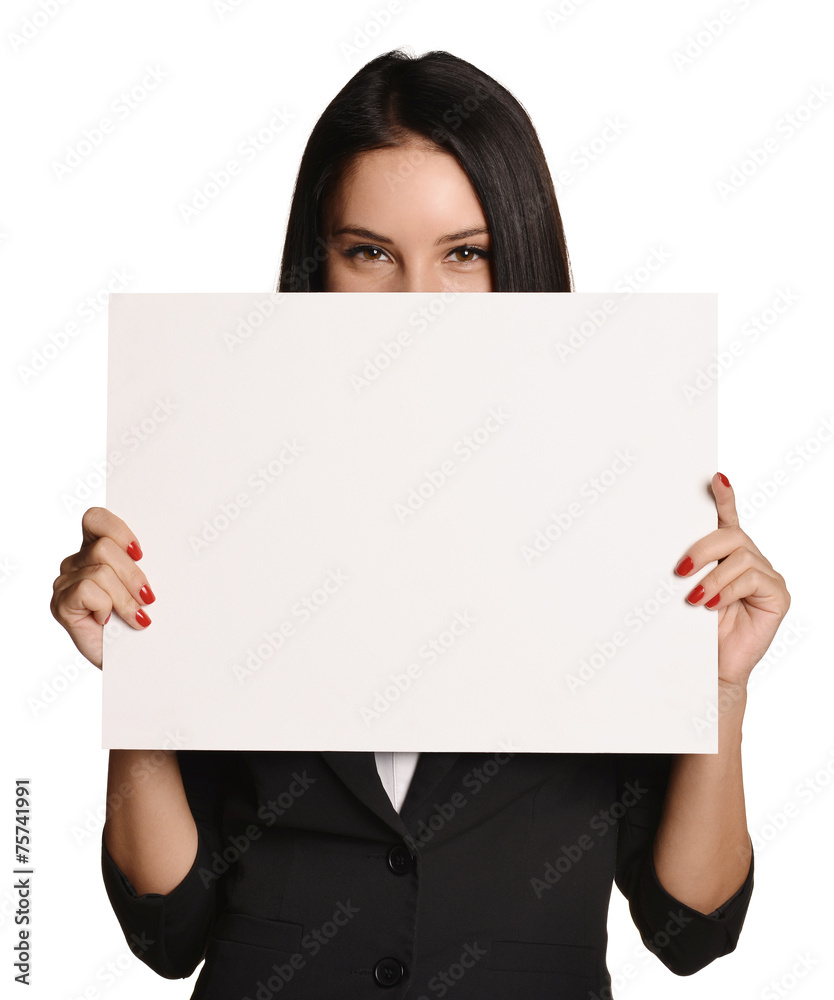 Business woman holding in hand a blank sheet of white cardboard
